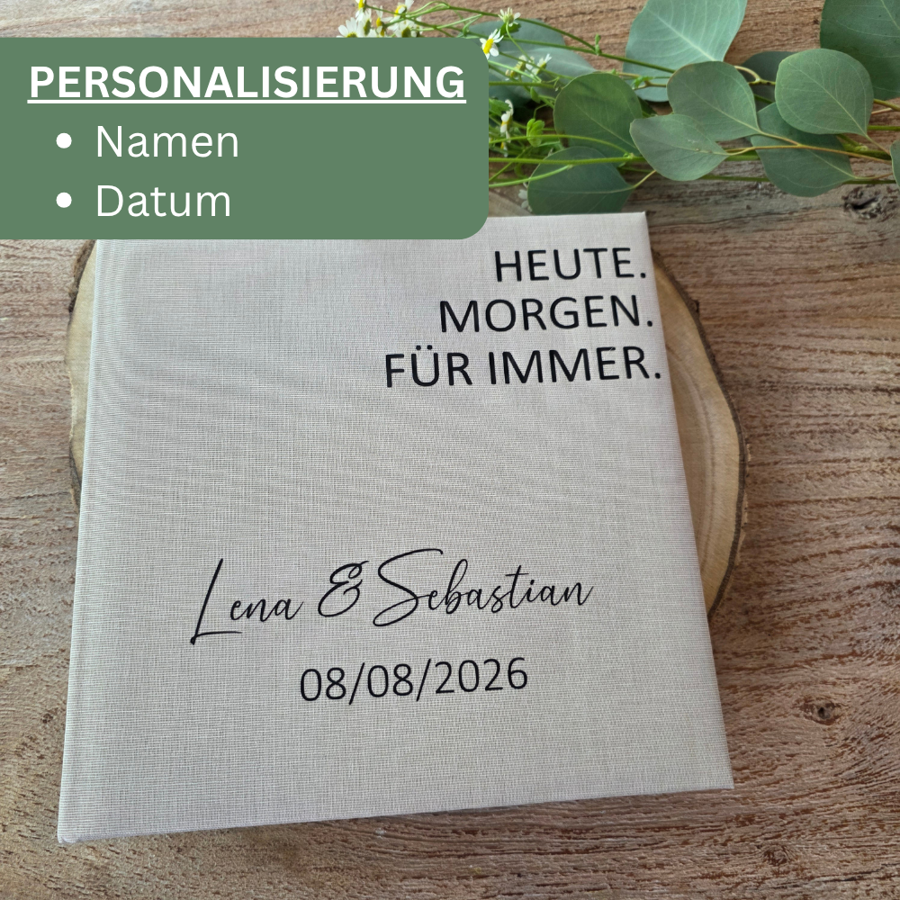 Personalisiertes Gästebuch Hochzeit aus Leinen mit individueller Gestaltung durch Namen des Brautpaares und Hochzeitsdatum.