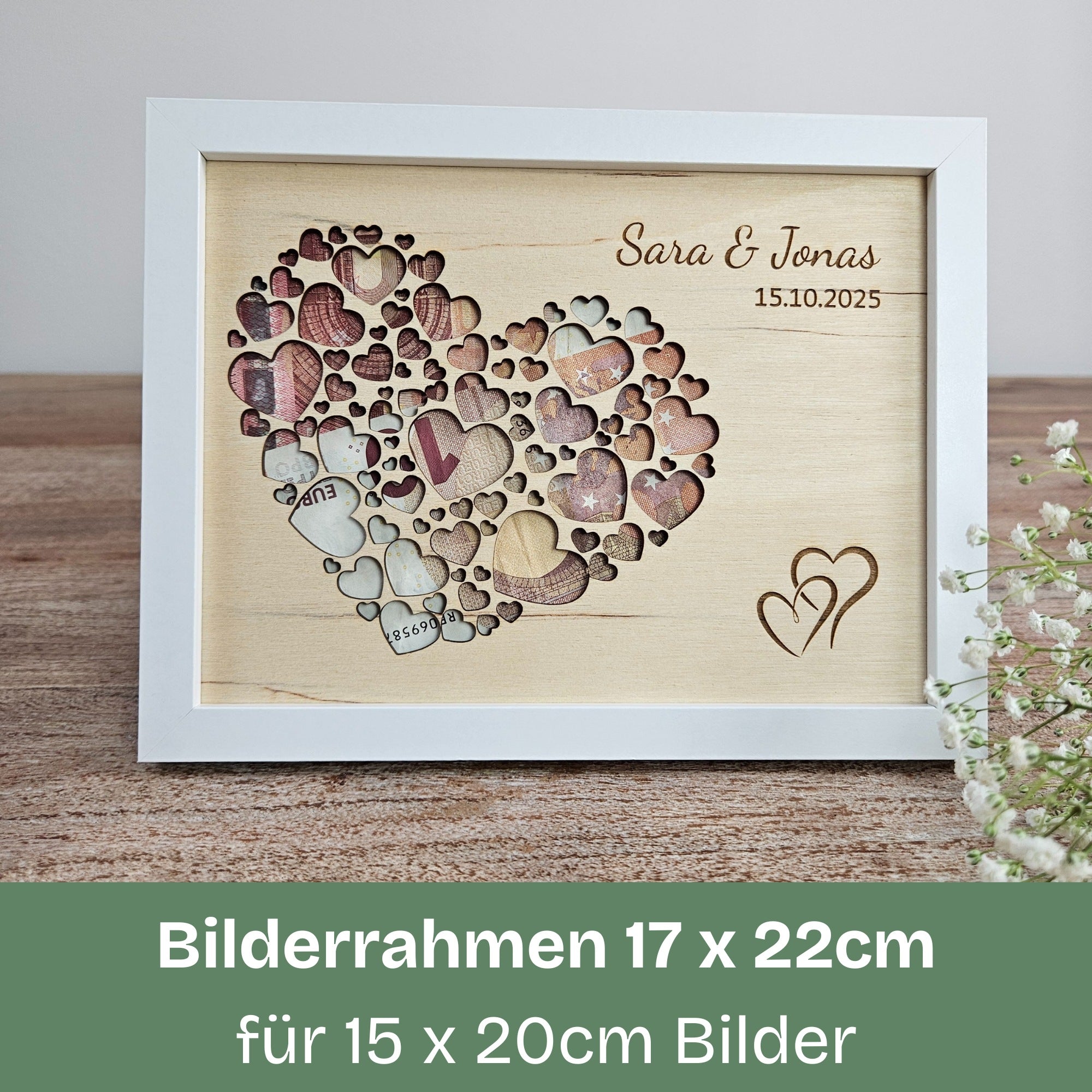 Großes Geldgeschenk zur Hochzeit – Bilderrahmen mit gravierten Herzen und Geldscheinen als Füllung