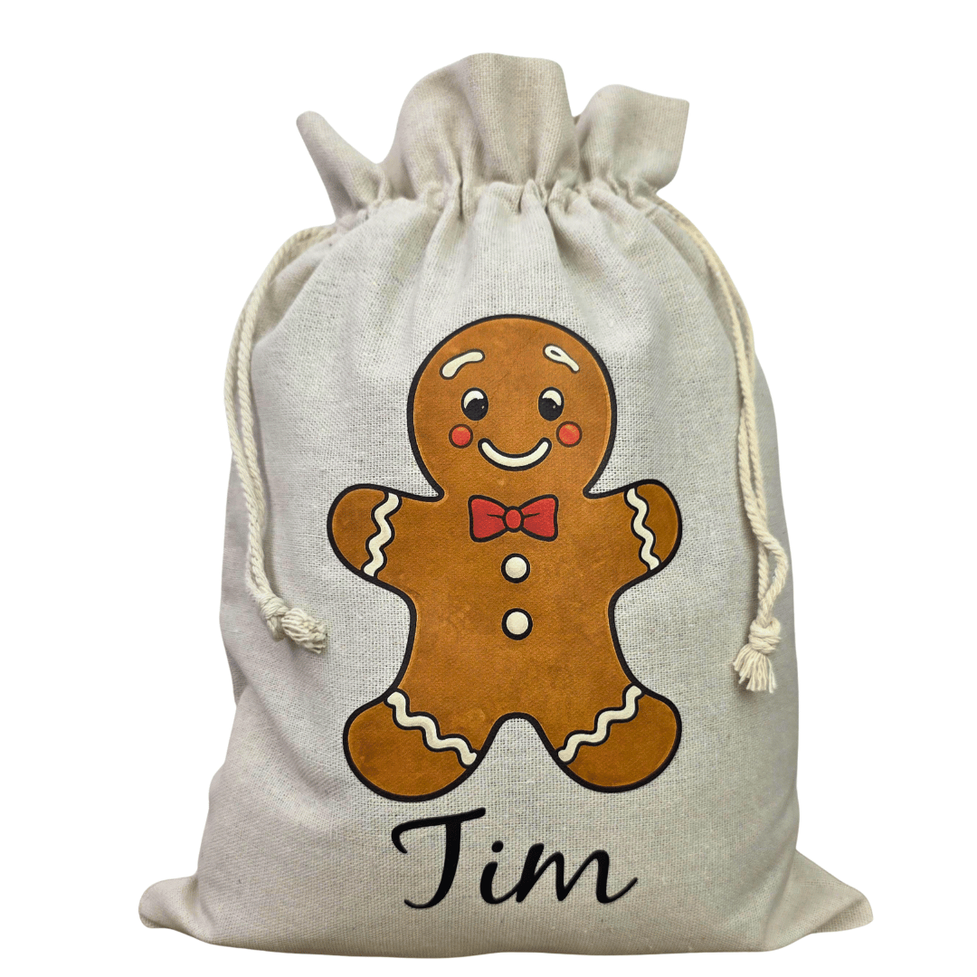 Personalisierter Nikolaussack mit niedlichem Lebkuchenmann-Motiv und individuellem Wunschnamen auf naturfarbenem Weihnachtssack.